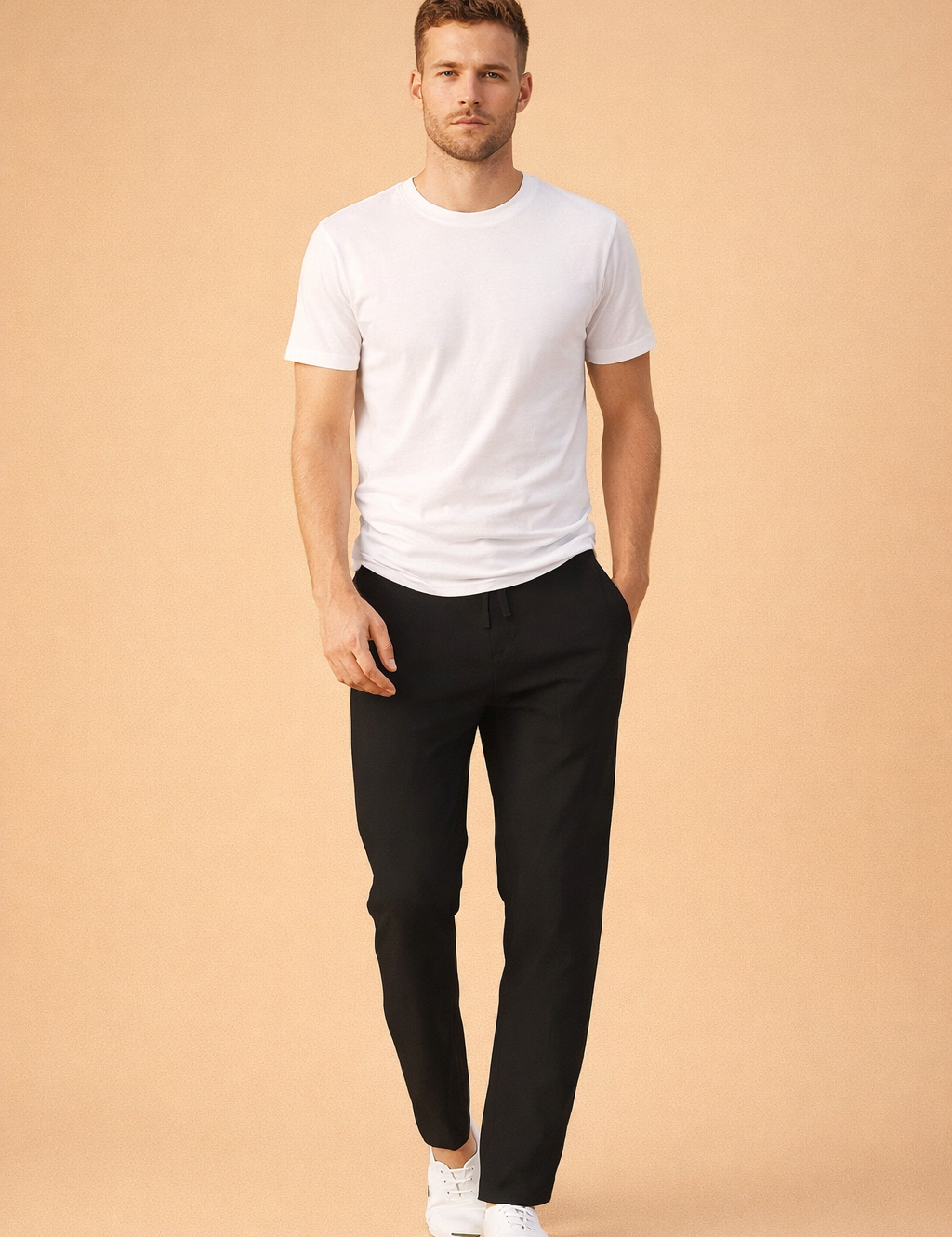 Slim-fit black tailored trousers with clean straight legs, smooth structured drape, flat front waistband, subtle front pockets, and a refined minimalist finish styled for a modern smart-casual look.