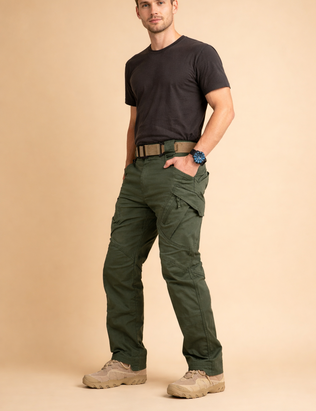 Structured tactical cargo pants with articulated knees, angled thigh pockets with flap and zipper detailing, straight-leg cut, reinforced seams, and a clean utility finish styled with a fitted short-sleeve top and lace-up outdoor boots.