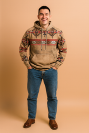 Men's tan tribal patterned hoodie with geometric red, black, and brown designs, paired with blue denim jeans and brown leather shoes