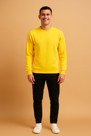 Bright yellow crewneck sweatshirt with long sleeves, ribbed cuffs, and a ribbed hem, offering a bold casual streetwear style.