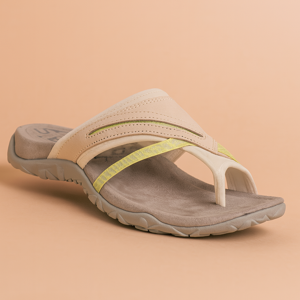Women's beige and yellow thong sandal with suede footbed and textured rubber sole, featuring layered straps and perforated detail.