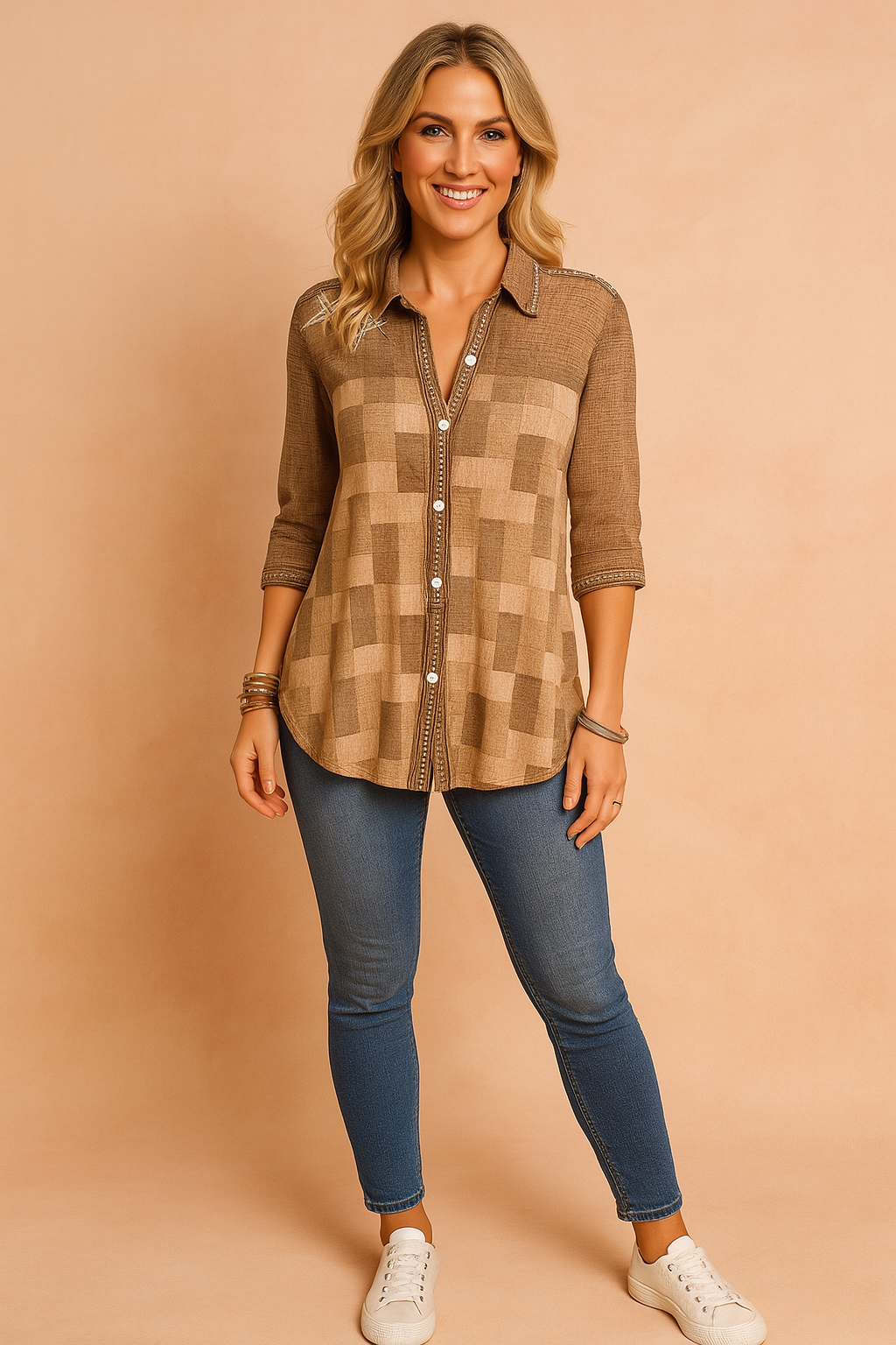 Women's casual outfit featuring a checkered button-up brown shirt with 3/4 sleeves, paired with high-waisted blue skinny jeans and white low-top sneakers.