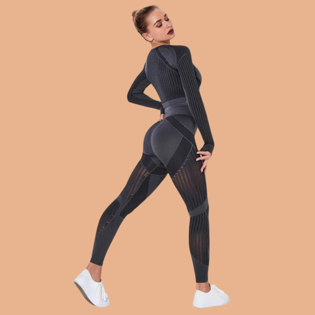 Szare legginsy sportowe z siateczkowymi panelami, wysoki stan, dopasowany krój do fitnessu i jogi