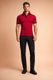 Red short-sleeve polo shirt with black contrast collar and sleeve trim, clean button placket, smooth solid fabric texture, paired with tailored black slim-fit trousers and classic black leather lace-up dress shoes