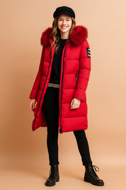 Women's long red puffer parka with faux fur hood, full front zipper, and side pockets, styled for winter warmth