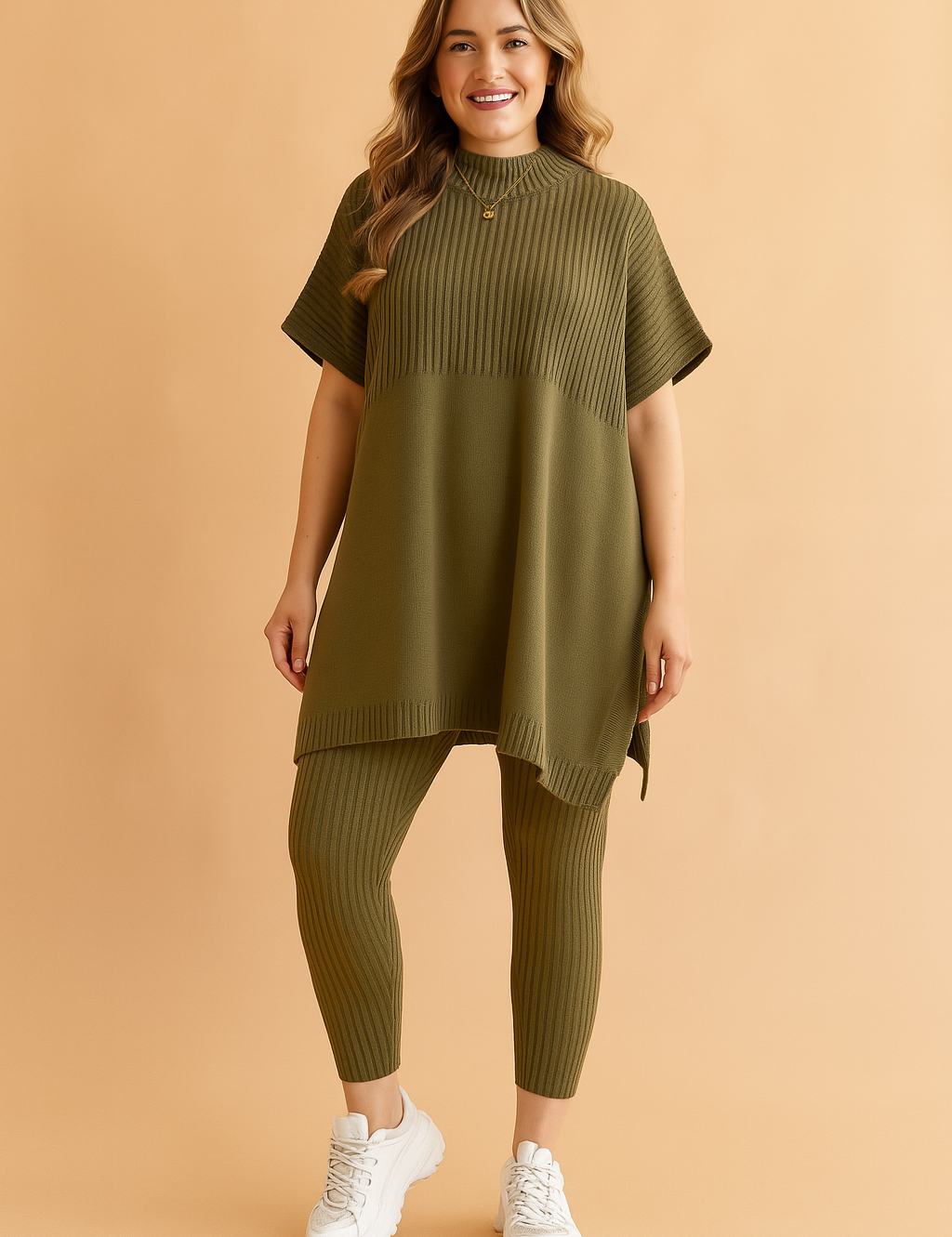 Two-piece ribbed knit co-ord set featuring an oversized short-sleeve tunic and matching fitted leggings in deep olive green, styled with side slits and a high neckline for casual comfort.