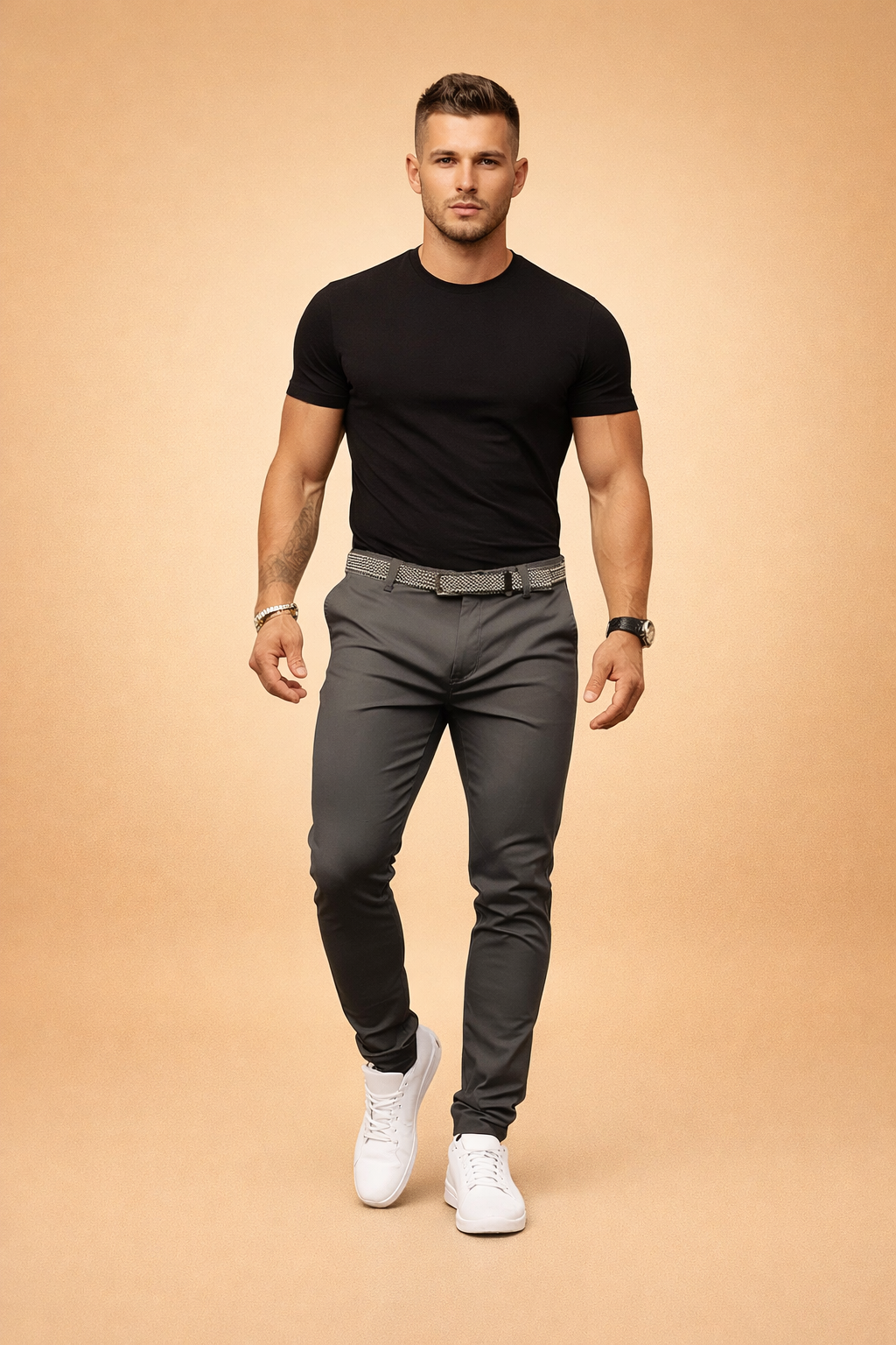 Slim-fit tailored pants with a clean tapered leg, smooth structured drape, mid-rise waist, straight front closure, and a refined belt detail, styled with a fitted short-sleeve top and minimalist low-profile sneakers.