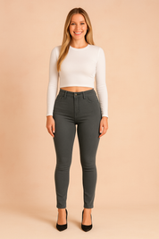 High-waist slim-fit jeggings in deep gray, featuring a sleek front button closure, defined seams, and a flattering stretch fabric that enhances shape while ensuring comfort.
