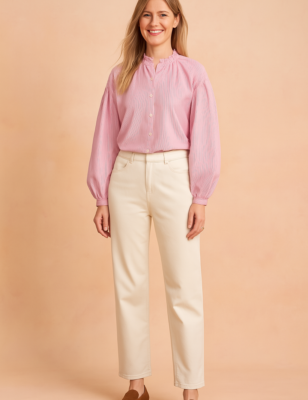 Pink and white vertical striped blouse with a gathered ruffle collar, front button closure, and long balloon sleeves, paired with high-waisted cream trousers and brown loafers.