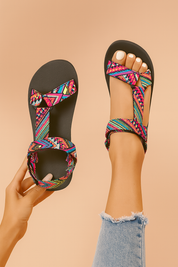 Women's colorful geometric-patterned platform sandals with adjustable tribal-style fabric straps and thick black soles, ideal for casual summer wear.