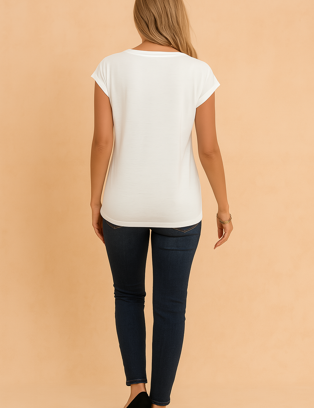 Short-sleeve white crew-neck T-shirt with cuffed sleeves and a slightly curved hem, paired with dark blue fitted jeans.