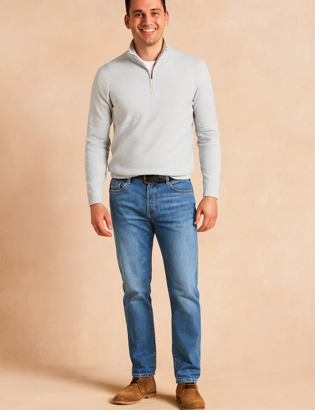 Men’s white half-zip pullover sweater with ribbed cuffs and hem, paired with straight-fit blue jeans and brown chukka boots, designed for a clean and versatile casual style