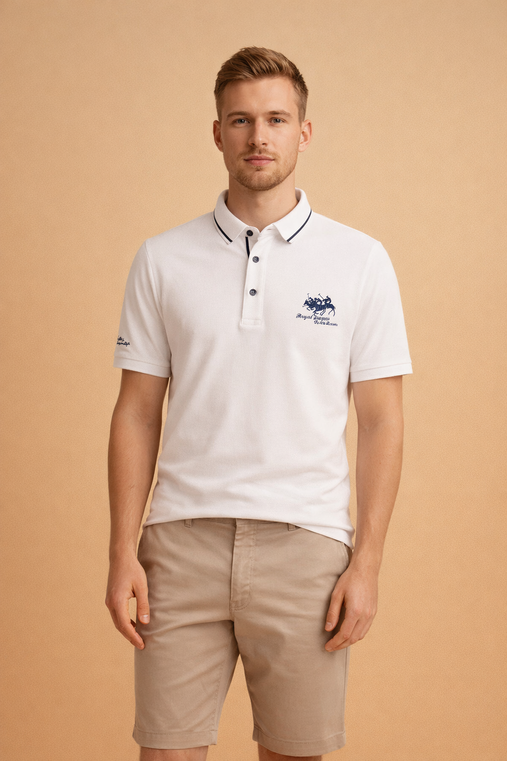 White short-sleeve polo shirt with navy contrast collar piping, three-button placket, and embroidered crest logo, paired with beige tailored chino shorts in a clean, classic cut.